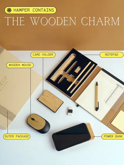 A detailed look at what's inside The Wooden Charm hamper. This employee welcome kit is packed with useful items like a wooden mouse, power bank, notepad, and card holder.