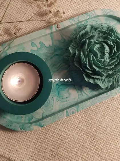 A festive green Christmas gift set, featuring our oval trinket tray, a peony aroma diffuser, and a t-light holder.