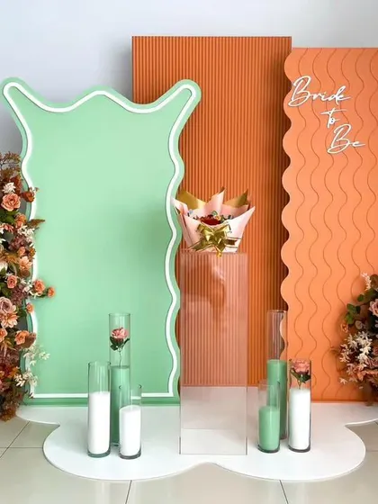 For a more modern and artistic bachelorette party, I designed this backdrop with abstract shapes and a trendy color palette. The "Bride to Be" sign adds a celebratory touch to the contemporary design.