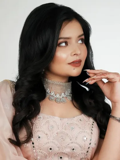 A candid-style shot that looks natural and effortless, showcasing the wearability of the makeup.
