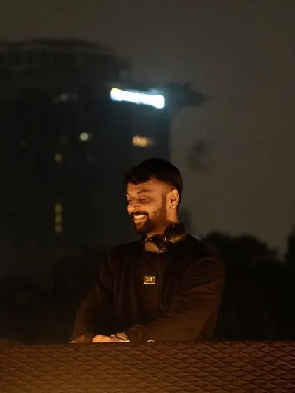 A moment of pure joy, smiling behind the decks. This is what it looks like when I'm completely in my element.