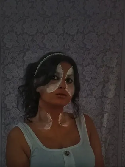 This is a moon-inspired makeup look I created. Using white and silver tones, I designed a celestial, glowing effect on the face and neck, showing that styling can be as simple and creative as makeup.