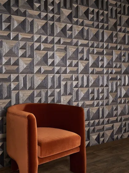 For those who appreciate modern innovation, our 3D wallcoverings offer sculptural elegance. This design, featuring geometric wood veneer, plays with light and shadow to create a dynamic and visually engaging surface.