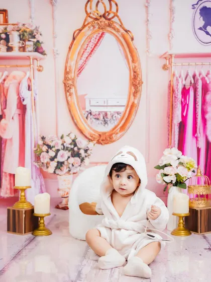 A wider view of the "pamper-me" princess setup, complete with a clothing rack and vanity mirror.