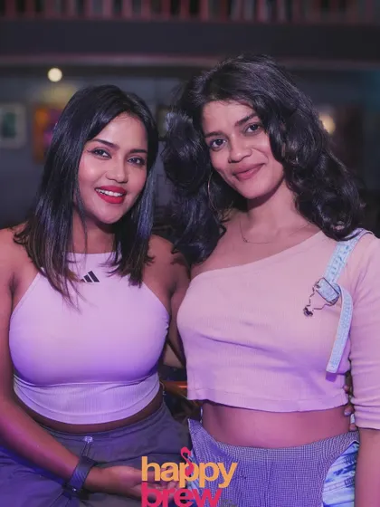 Friends posing for a photo at Happy Brew during our Thursday karaoke and DJ night.