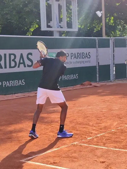 Training on the clay courts of Roland Garros. Competing in Grand Slams keeps my skills sharp and my understanding of the modern game current, which is vital for our coaching programs.
