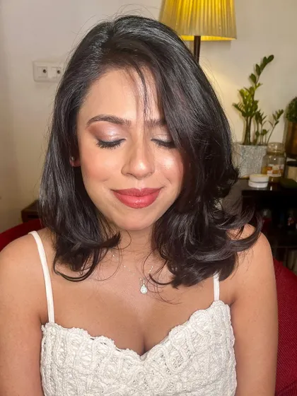 A close-up of the eye makeup, which is soft, shimmery, and beautifully blended.