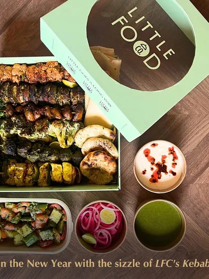 A beautifully styled shot of a smaller Kebab Box, perfect for an intimate New Year's gathering. It includes a curated selection of kebabs, dips, and salad, all packed and ready to enjoy.