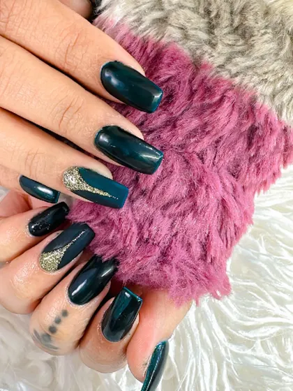 Another angle of these gorgeous deep teal nails, showing how the color looks against a soft texture.