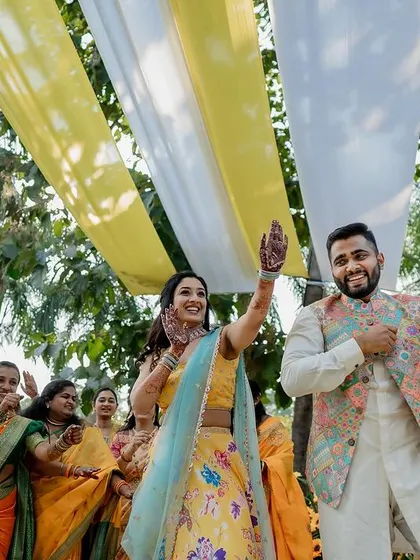 A collection of fun and vibrant moments from a sun-drenched Haldi. From playful entries to candid portraits, we capture the complete story of this joyous celebration.
