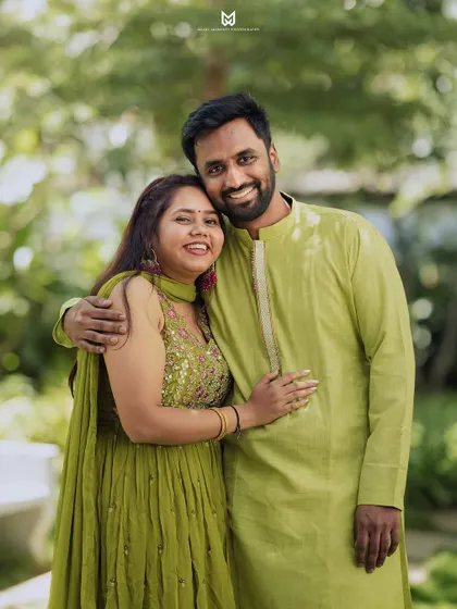 A classic, happy portrait of the couple on their Mehandi day. They look so comfortable and joyful in each other's arms.