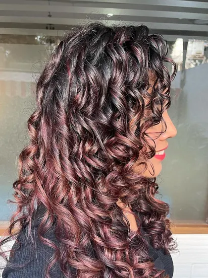 A side view of the burgundy pintura highlights.