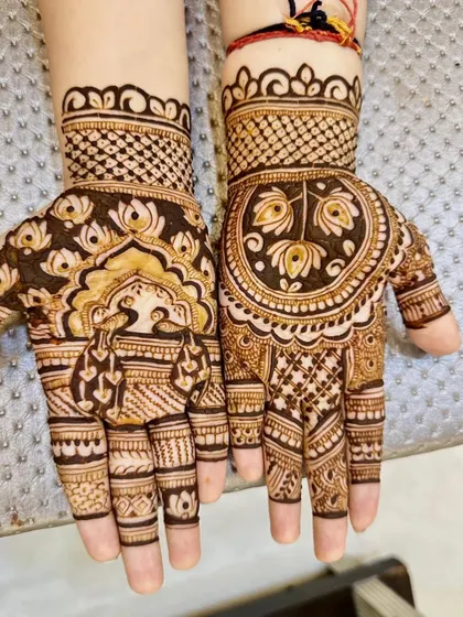 A lovely design combining peacocks and lotuses for Teej.