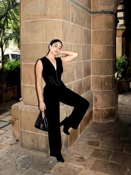 Kritika Kamra looking absolutely stunning in this all-black corset jumpsuit from Mamkam. It's a powerful, sophisticated, and effortlessly cool look.