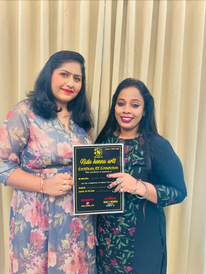 A proud moment with another graduate. Her journey in my class has been incredible, and she is now a certified artist.