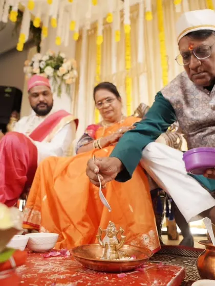 Capturing the traditional 'puja' that is an integral part of the wedding ceremony, with all its detailed rituals.