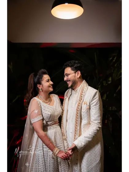 Ashwini and her husband at their Sangeet. We provided a makeover for the groom as well, ensuring they looked like a perfect match.