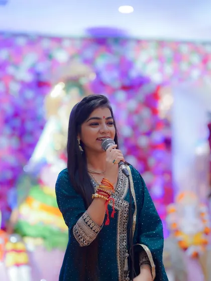 Performing for a showreel. The colorful background and professional setup are part of the grand events I perform at.