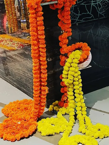 Traditional marigold flower garlands used for decoration. I use fresh, vibrant flowers to bring a classic and auspicious feel to your event.