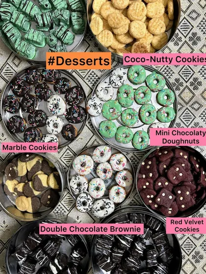 Happiness is a box of homemade, eggless desserts. I love creating these sweet assortments, which include everything from Double Chocolate Brownies and Red Velvet Cookies to Mini Chocolatey Doughnuts and traditional Marble Cookies.