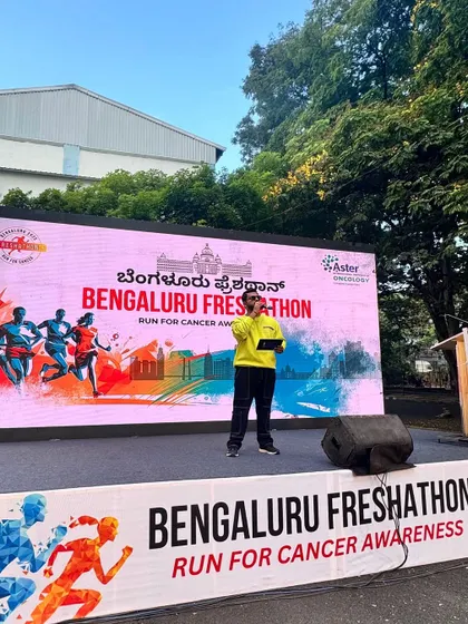 On stage at the Bengaluru Freshathon. Hosting a marathon means you have to start with high energy to motivate thousands of runners at the crack of dawn.