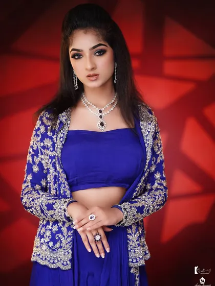 The final portrait from a student's portfolio shoot, showcasing a complete and professional modern glam look.
