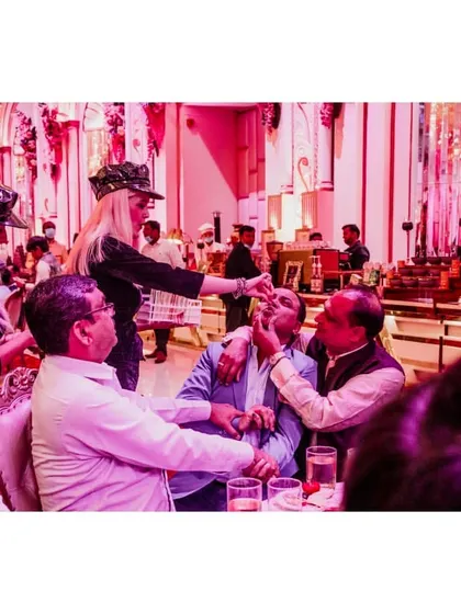 Our international shot girls engage with guests, making sure everyone is having a great time and participating in the fun.