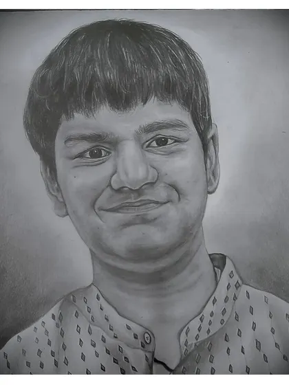 A custom graphite portrait of a young man. The focus here was on creating a soft, friendly expression with subtle shading. These pencil sketches are a great way to capture the personality of a loved one.