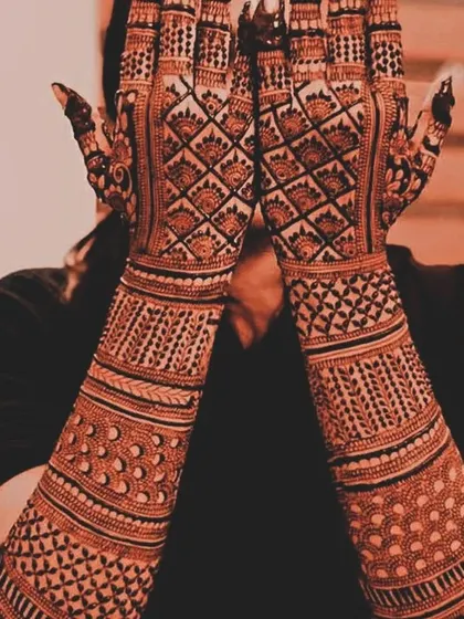 This is a Madhubani-inspired design, known for its geometric patterns and bold, filled-in spaces. It creates a very striking and unique look.
