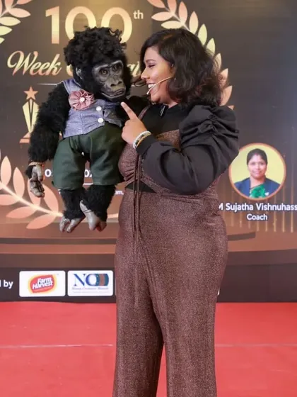 Nikki always tries to steal the show, even during award presentations. His playful antics keep formal events from ever getting dull.