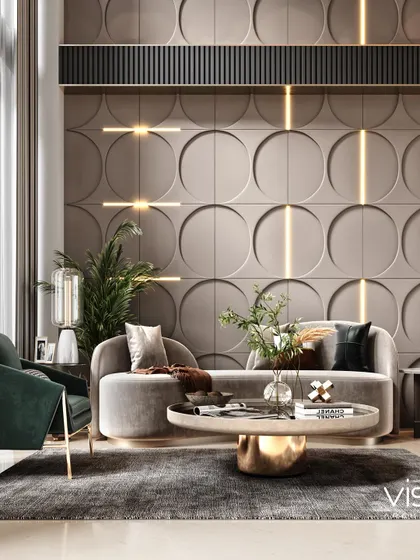 A detailed shot of the seating arrangement in the duplex living room, highlighting the elegant curves of the sofa and the contrast between the dark armchair and neutral tones.