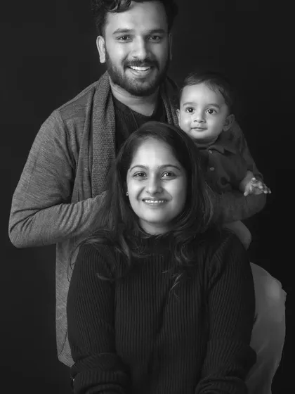 A classic family portrait, offered here in black and white to emphasize emotion and connection. I can provide your final gallery in both color and monochrome.