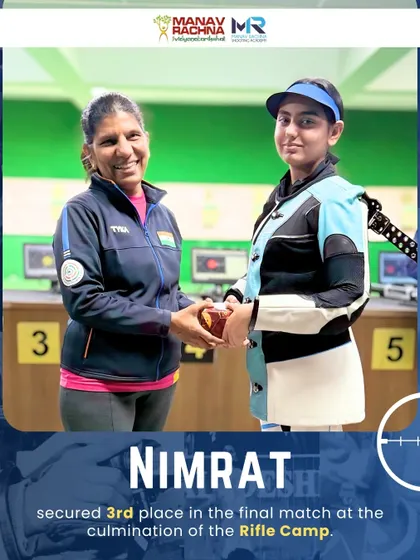 Nimrat, one of our promising young shooters, receives her 3rd place prize from Coach Deepali Deshpande at the conclusion of our specialized rifle training camp.
