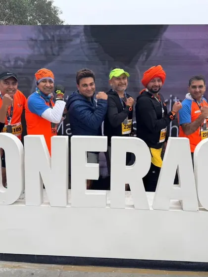 Our runners at the Super Sikh Run, striking a pose. We run hard and celebrate harder.