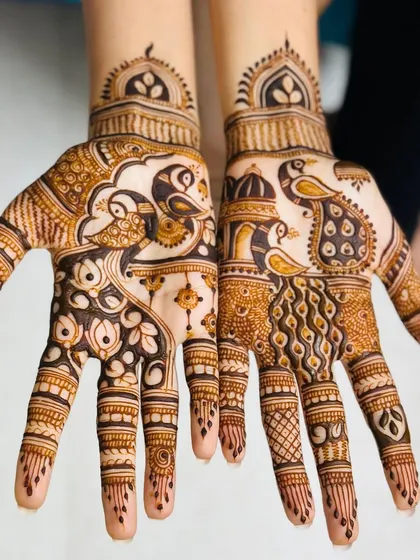 A minimal engagement design with peacocks, as requested by the bride.