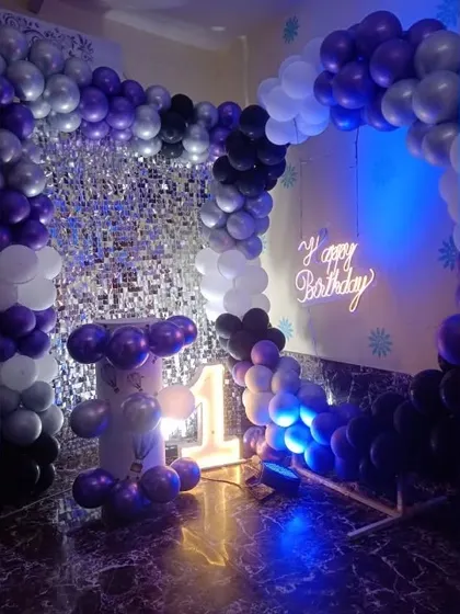 Blue uplighting gives this party setup a cool and modern feel.