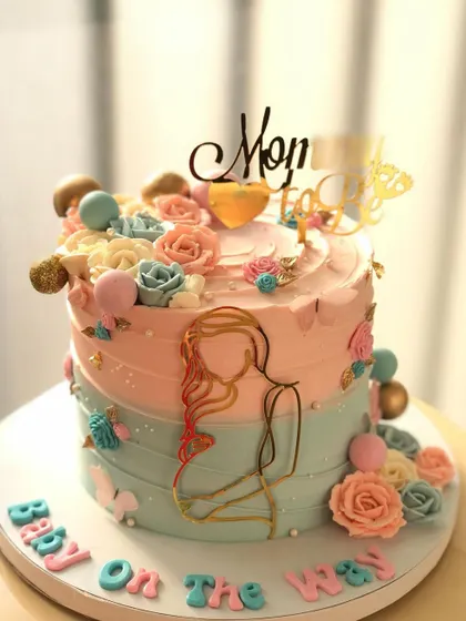 Another angle of the "Baby on the Way" cake, showing the delicate details.