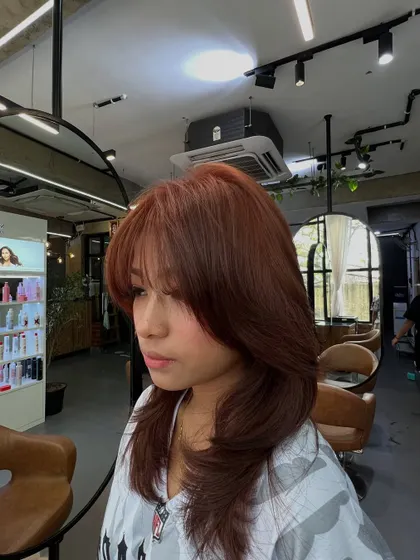 The trendy hush haircut. This style features soft, lightweight layers that frame the face, creating a romantic and effortlessly chic look that's easy to manage every day.