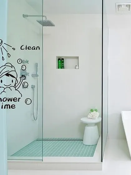 Another view of the fun 'Shower Time' decal, perfect for adding a touch of whimsy to a family bathroom's glass enclosure.