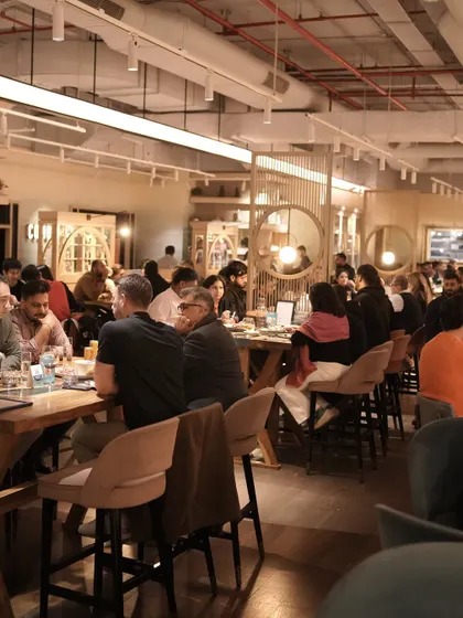 A full house at Comorin. The restaurant buzzes with the energy of happy diners, a testament to the food, drinks, and atmosphere we've cultivated.