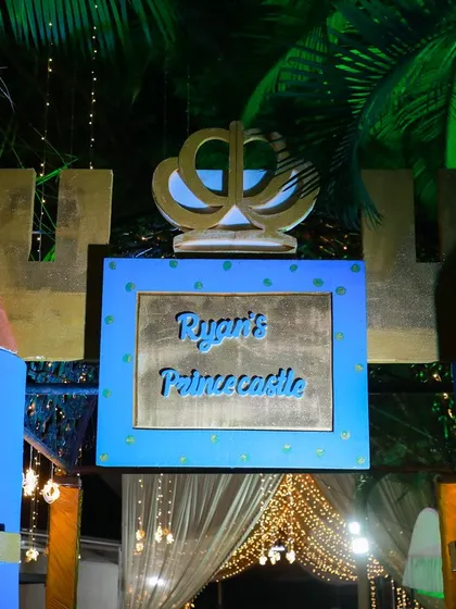 The entrance to Ryan's Prince Castle, featuring custom-made turrets and a royal crest. This grand entrance made every guest feel like they were entering a real kingdom.