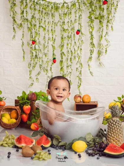 Our milk bath sessions are pure joy. We fill a tiny tub with a safe, warm bath and lots of colorful fruits, creating a playful sensory experience that brings out the biggest smiles.