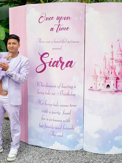 A life-sized storybook entrance we created for a princess-themed first birthday, telling the birthday girl's own fairytale.