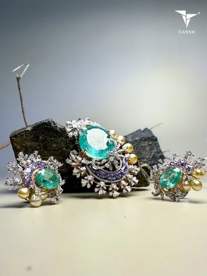 Emeralds that feel like whispers of ancient forests, diamonds that mimic starlight, and pearls that carry the hush of the ocean. This is nature’s poetry, sculpted into a masterpiece for your skin.