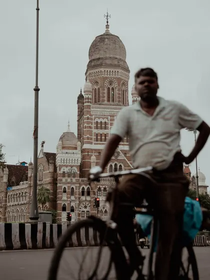 A collection of day and night shots of the Brihanmumbai Municipal Corporation (BMC) building, another iconic piece of Gothic architecture. The images capture its grandeur from various angles and in different lights.