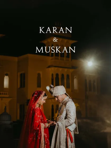 A classic wedding portrait against the backdrop of a beautifully lit palace at night. This shot captures the timeless romance and grandeur of their destination wedding.