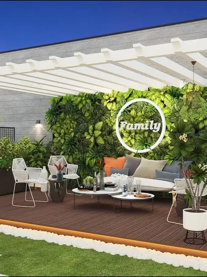 Another view of the white pergola design, showing how it creates a bright and airy outdoor room.