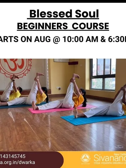 A view of our beginner class practicing a supine leg stretch. The course is designed to systematically build your strength and flexibility.