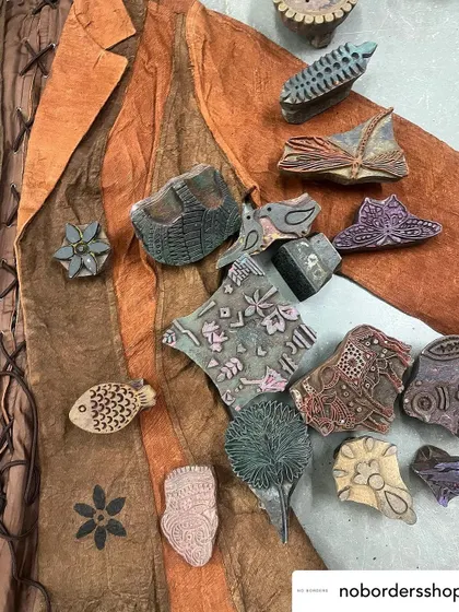 For this collaboration with No Borders, we experimented with printing on rare bark cloth. Our artisans used natural black dye to print nature-inspired motifs onto these statement jackets, bringing two ancient craft worlds together.