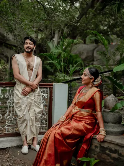 A moment of quiet connection amidst the grandeur of The Tamarind Tree. We love using the venue's stunning architecture to frame our couples, creating a story of romance and tradition.
